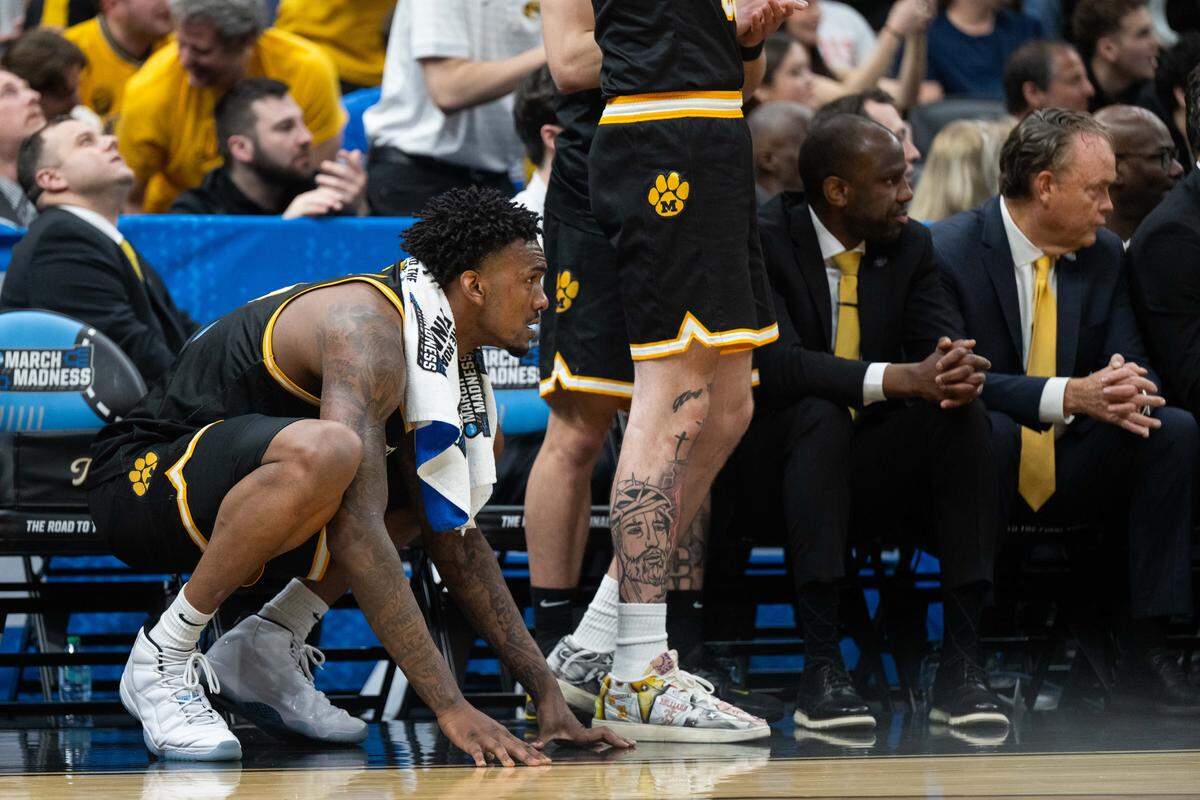 Missouri Tigers center Shawn Phillips Jr. (15) crouches and watches his teammates on defense in the second half of the Tigers first-round NCAA Tournament matchup vs. the Miami Hurricanes at Enterprise Center in St. Louis on Friday, March 20, 2026.