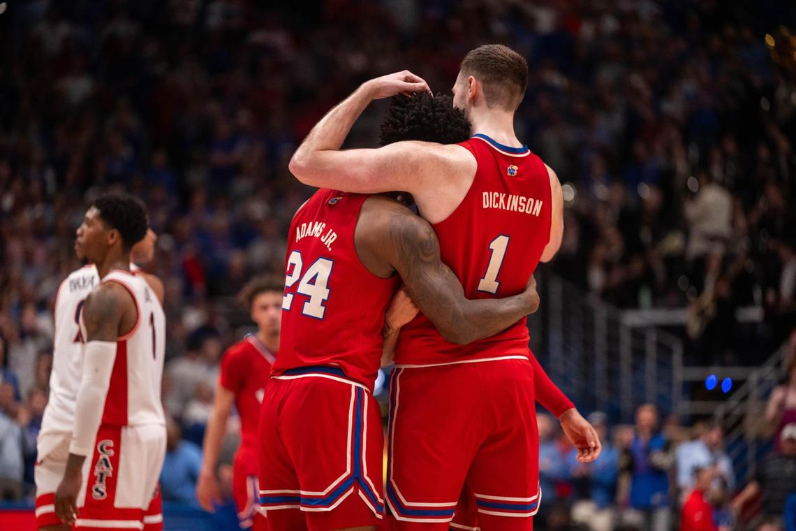 Kansas Jayhawks seniors KJ Adams and Hunter Dickinson hug at the end of the win on Senior Day vs. the Arizona Wildcats on Saturday, March 8, 2025, at Allen Fieldhouse.