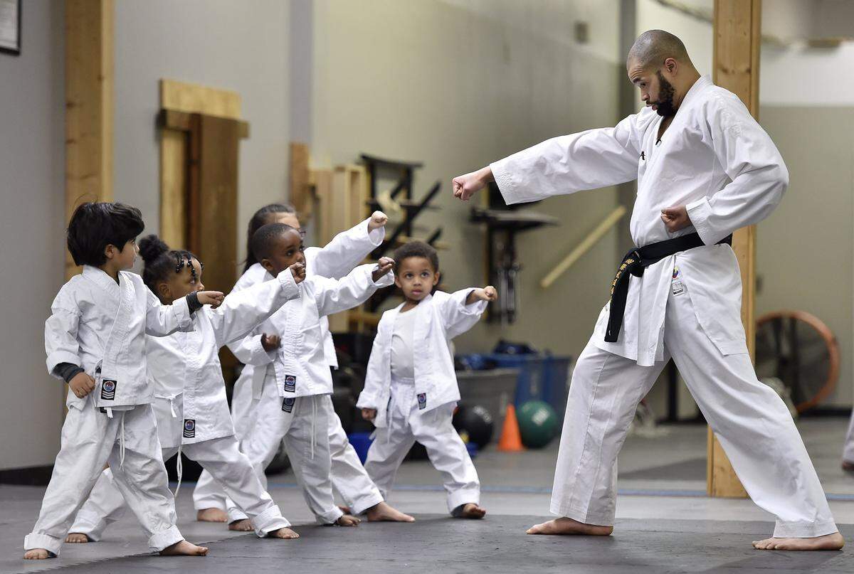 David Muhammad in 2017 at the dojo founded by his father, Integrity Martial Arts, the year he competed on the U.S. Karate team at the Pan American Games.
