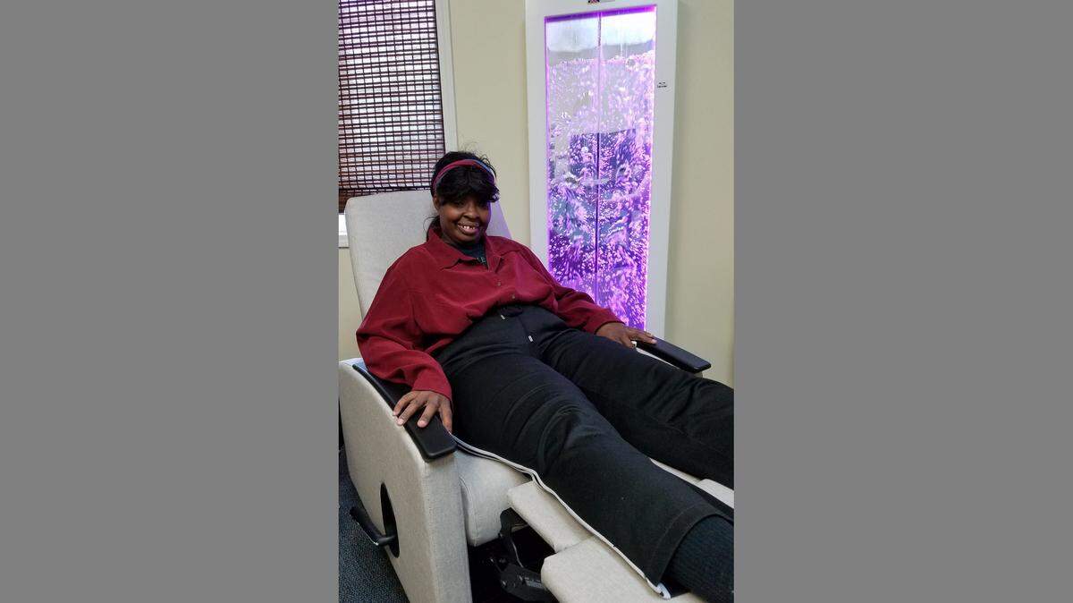 Fatima Davis uses equipment at Developing Potential that the organization purchased with help from the Greater Lee’s Summit Healthcare Foundation.