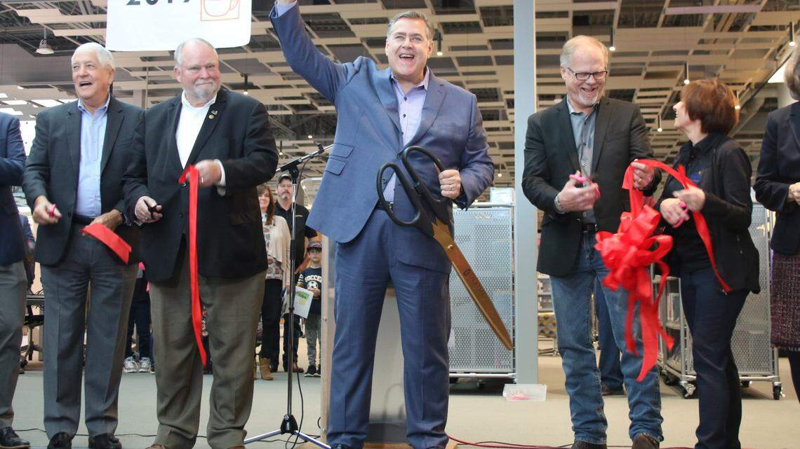 Michael Copeland, the Olathe major who died Aug. 19, celebrated with members of the Olathe City Council at the October opening of the Indian Creek Library.
