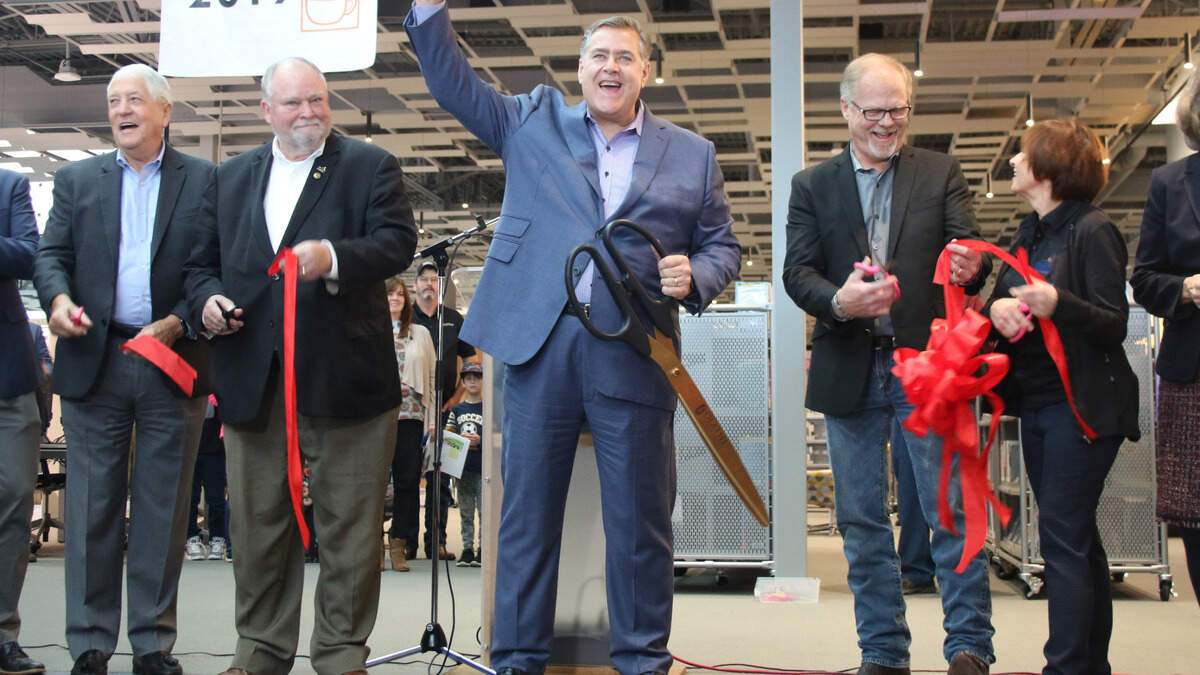 Michael Copeland, the Olathe major who died Aug. 19, celebrated with members of the Olathe City Council at the October opening of the Indian Creek Library.
