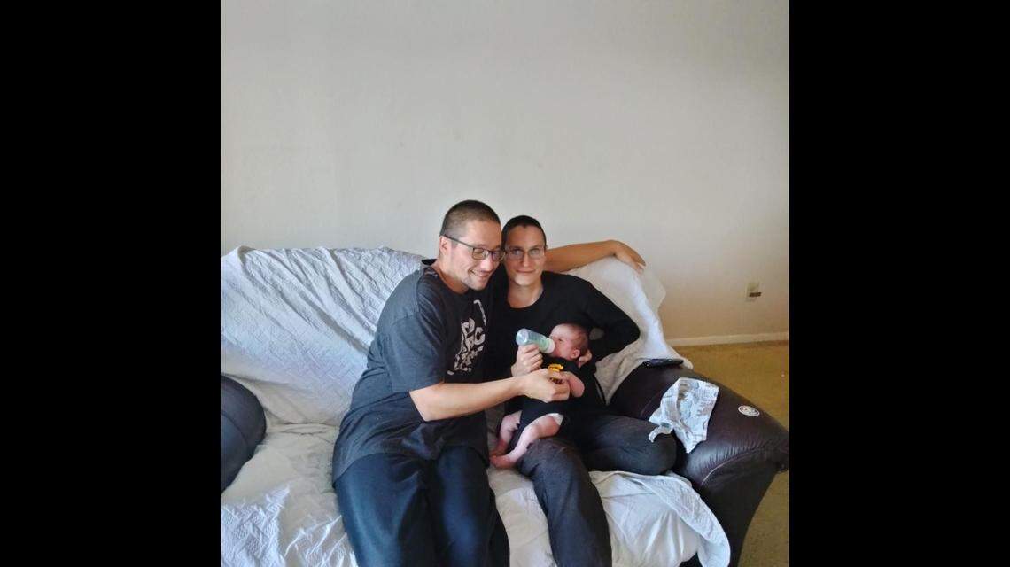 Mitchell Holder and Maria Pike hold their daughter, Destinii Hope. Pike and her 2-month-old daughter Destinii died on Nov. 7 after an Independence police shooting.