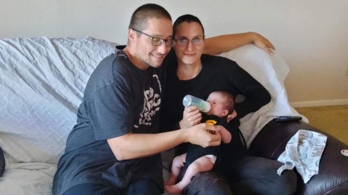 Mitchell Holder and Maria Pike hold their daughter, Destinii Hope. Pike and her 2-month-old daughter Destinii died on Nov. 7 after an Independence police shooting.
