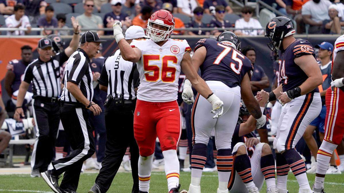 Rookie Chiefs defensive end George Karlaftis celebrates his sack of Chicago Bears quarterback Trevor Siemian during Saturday’s preseason opener at Soldier Field.
