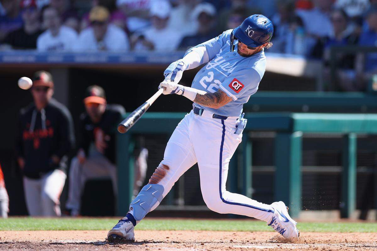 Kansas City Royals catcher Carter Jensen bats against the San Francisco Giants during the third inning of the spring training game at Surprise Stadium on March 11, 2026 in Surprise, Arizona.