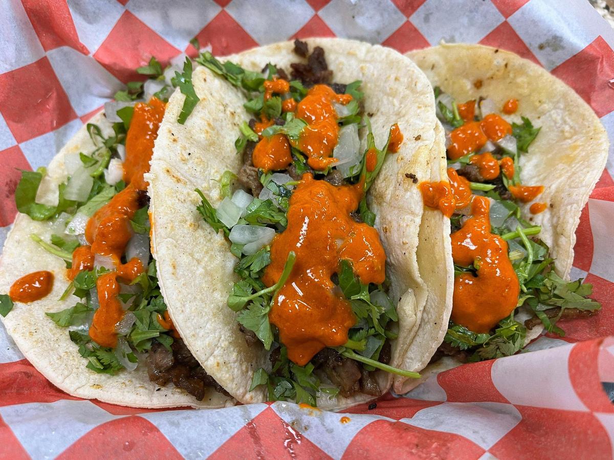 Three carne asada tacos with a spicy house-made salsa are served at Don Antonio in Kansas City, Kansas