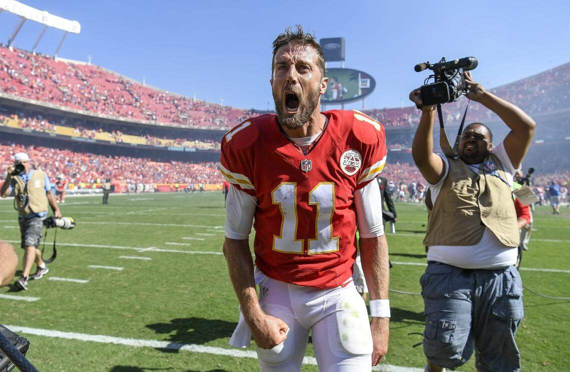 Kansas City Chiefs quarterback Alex Smith (11) shouted in celebration after his two-yard touchdown run in overtime won the game, 33-27, over the San Diego Chargers on September 11, 2016 at Arrowhead Stadium in Kansas City, Mo.
