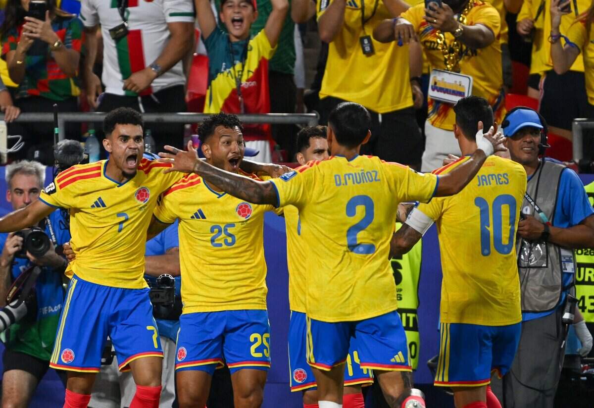 Colombia players celebrate after scoring the first goal vs. Ghana in a 2026 World Cup Round of 32 football match at Kansas City (Arrowhead) Stadium in Kansas City on Friday, July 3, 2026.