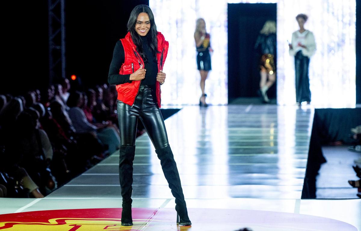 Michelle Young, runner-up on season 25 of “The Bachelor,”walks the runway in Chiefs clothing during the 12th annual Chiefs Style Lounge on Tuesday, Oct. 17, 2023, in Kansas City.