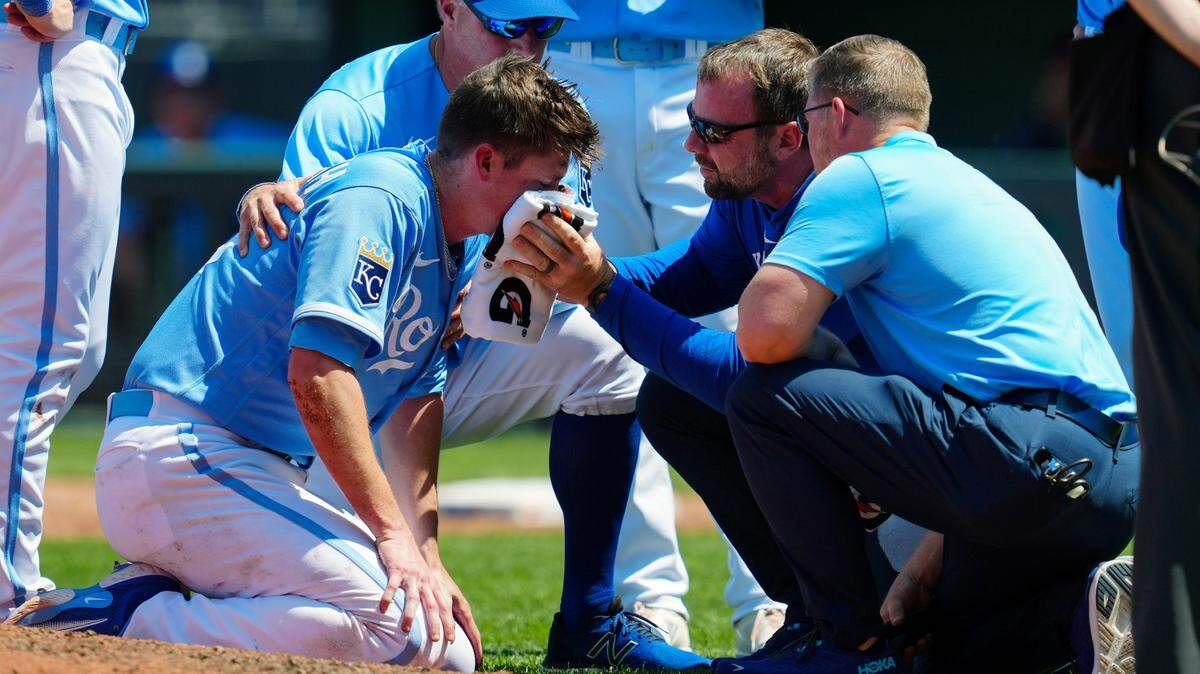 Starting pitcher Ryan Yarbrough is attended to by KC medical staff after being hit by a line drive off the bat of Oakland Athletics first baseman Ryan Noda during the sixth inning at Kauffman Stadium on Sunday.