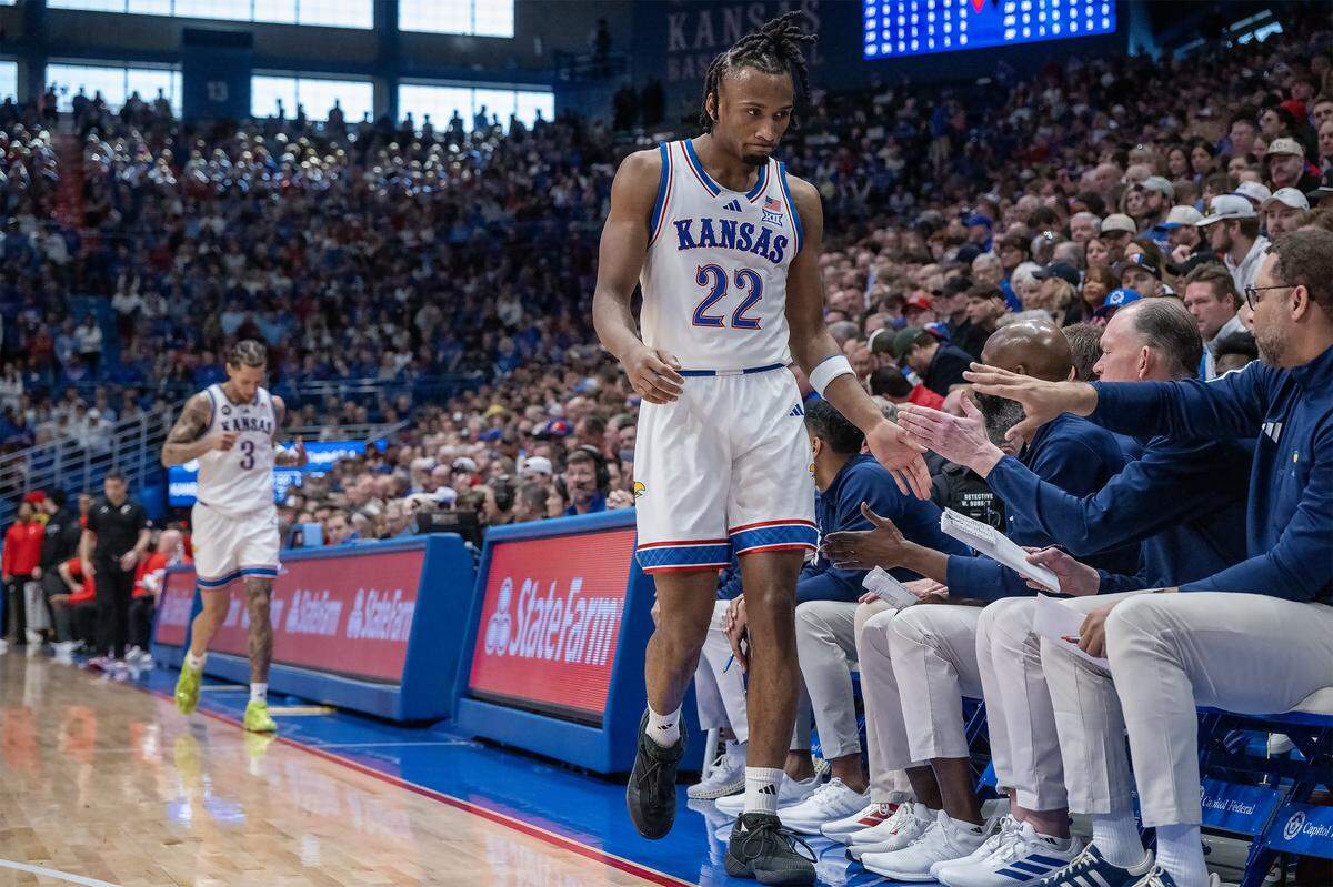 Kansas Jayhawks guard Darryn Peterson (22) heads to the bench in the second half against the Cincinnati Bearcats at Allen Fieldhouse on Saturday, Feb. 21, 2026, in Lawrence, Kansas.