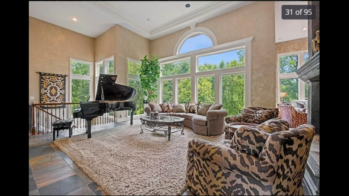 One of the living rooms on the second floor inside the home at 425 NE St. Andrews Circle in Lee’s Summit.