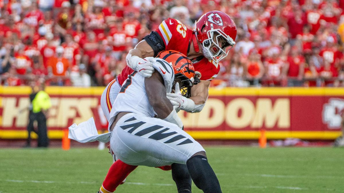 Kansas City Chiefs linebacker Drue Tranquill (23) tackles Cincinnati Bengals running back Zack Moss (31) in the fourth quarter during an NFL game on Sunday, Sept. 15, 2024 at GEHA Field at Arrowhead Stadium.