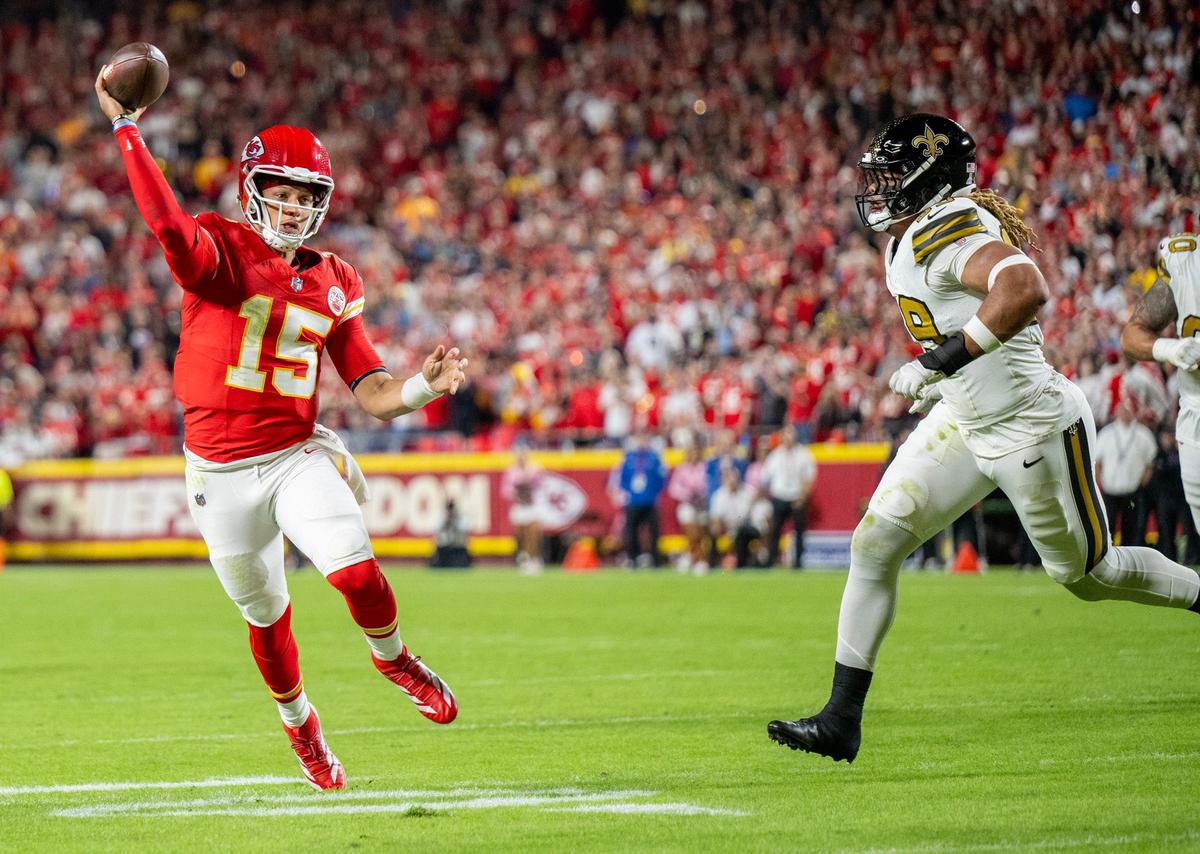 Chiefs quarterback Patrick Mahomes looks for a receiver in the first half against the New Orleans Saints at GEHA Field at Arrowhead Stadium on Monday, October 7, 2024.