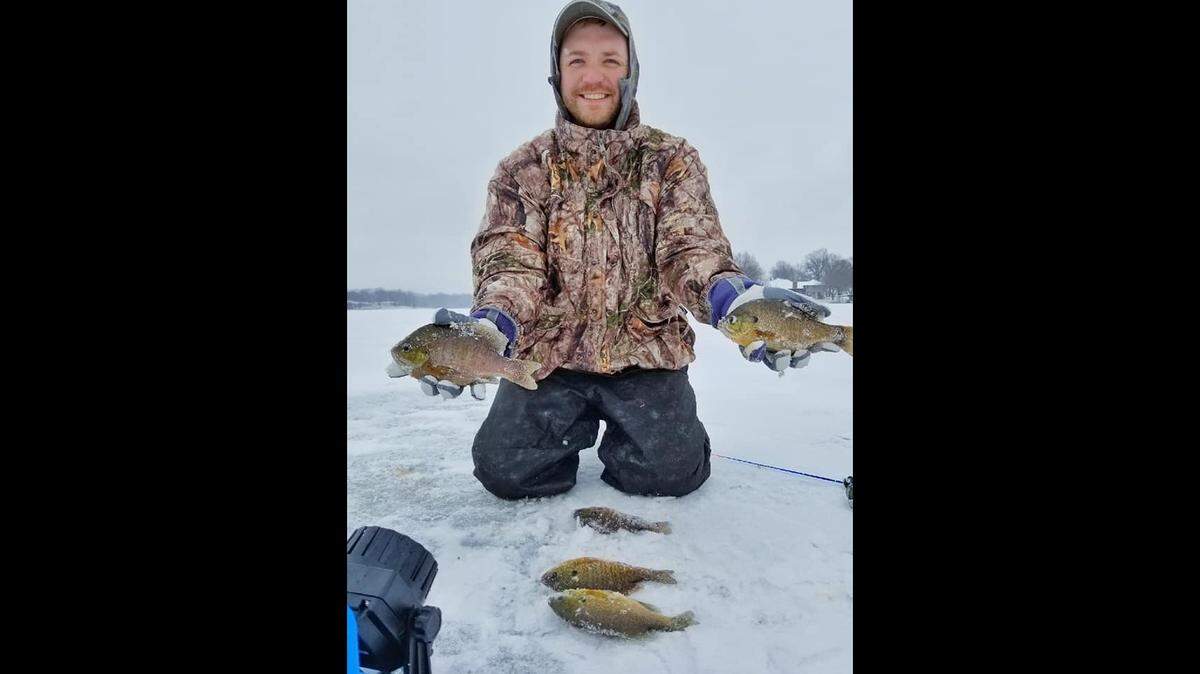 The author shows his catch of tasty bluegill caught through 10 inches of ice last weekend around Trenton, Mo.
