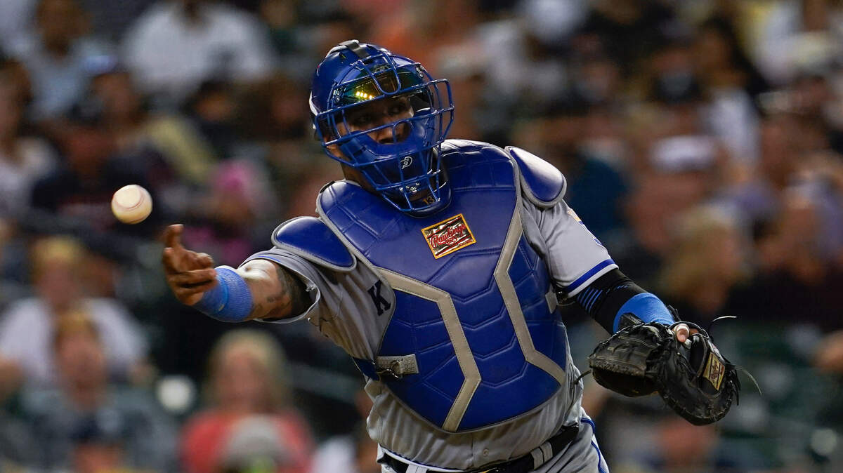 Kansas City Royals catcher Salvador Perez throws to first base against the Detroit Tigers in the fourth inning of a baseball game in Detroit, Friday, Sept. 2, 2022. (AP Photo/Paul Sancya)
