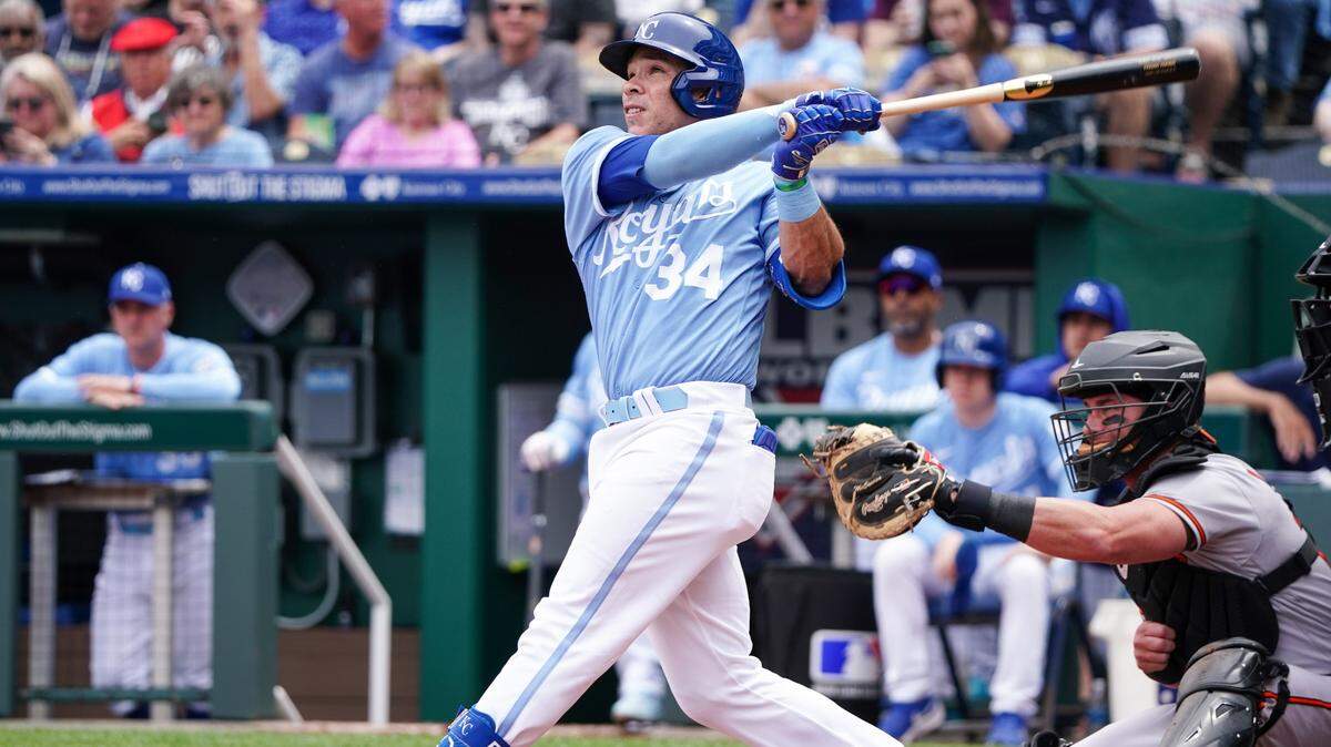 Royals catcher Freddy Fermin hits a solo home run against the Baltimore Orioles in the third inning of Thursday afternoon’s game at Kauffman Stadium.