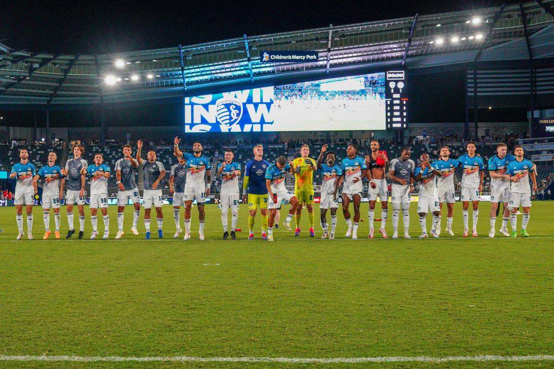 Sporting Kansas City players celebrate toward fans on field after the win over the Chicago Fire FC at Children’s Mercy Park on July 28, 2024.
