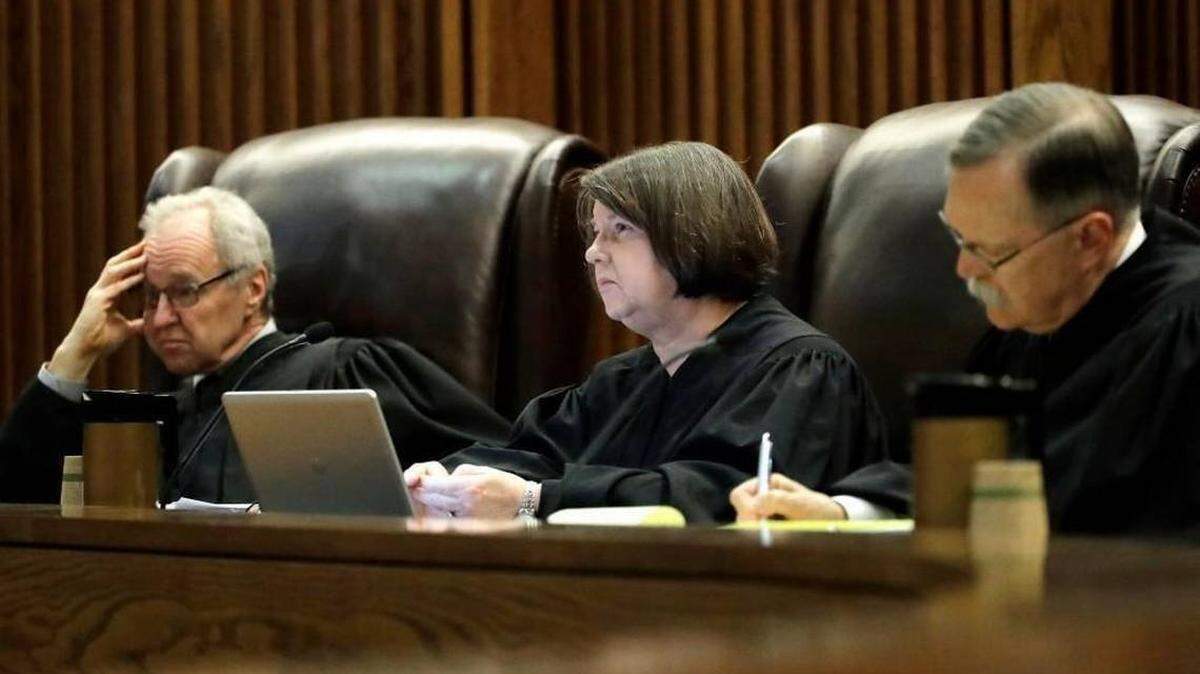 The Kansas Supreme Court on Monday issued its sixth decision in the Gannon school finance case. Above are Justices Eric Rosen (from left) and Marla Luckert, and Chief Justice Lawton Nuss.