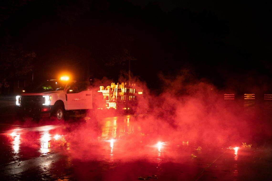 Flares block 95th Street in Leawood, KS early in the morning on June 8, 2022, after a suspected tornado struck.