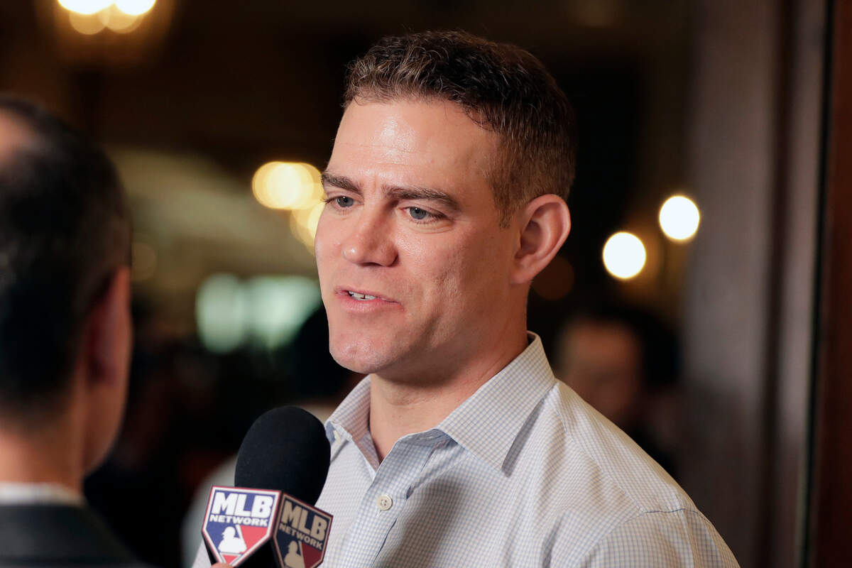 FILE - In this Nov. 13, 2019, file photo, Chicago Cubs president of baseball operations Theo Epstein speaks at a media availability during the Major League Baseball general managers annual meetings in Scottsdale, Ariz. Theo Epstein, who transformed the long-suffering Chicago Cubs and helped bring home a drought-busting championship in 2016, is stepping down after nine seasons as the club’s president of baseball operations. The team announced Monday, Nov. 16, 2020, Epstein is leaving the organization, and general manager Jed Hoyer is being promoted to take his place. (AP Photo/Matt York, File)