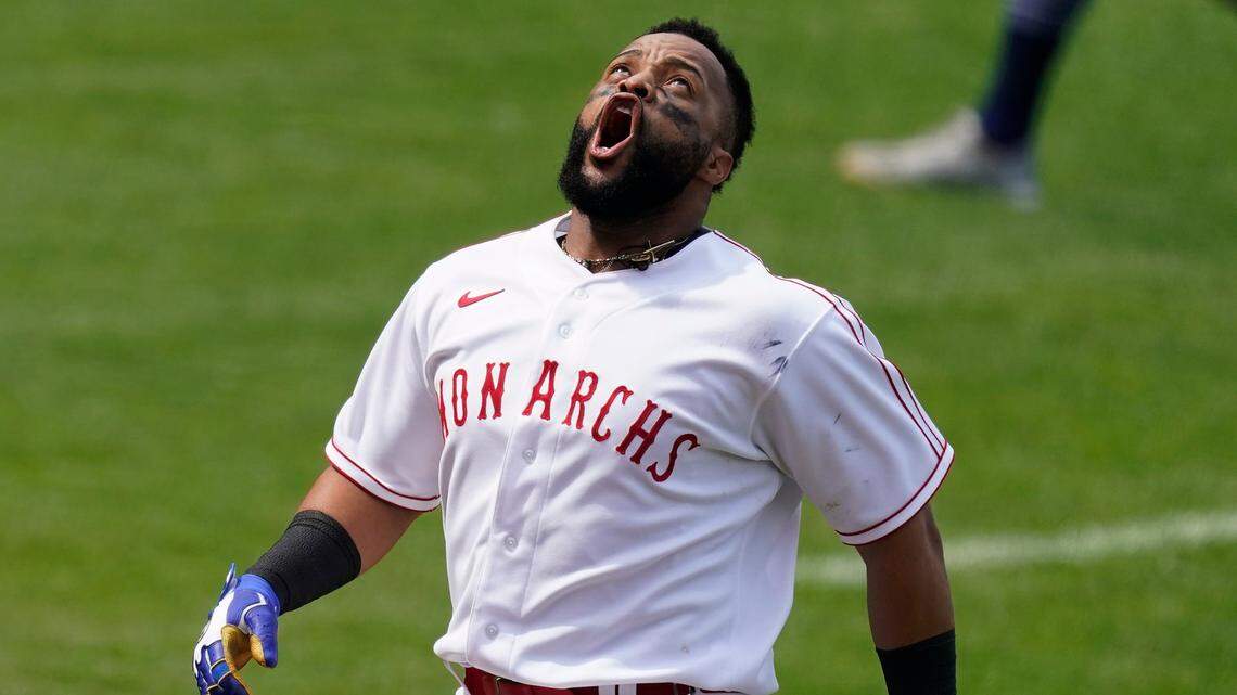 Kansas City Royals’ Carlos Santana celebrates after hitting a walk-off home run during the ninth inning of a baseball game against the Detroit Tigers Sunday, May 23, 2021, in Kansas City, Mo. The Royals won 3-2. (AP Photo/Charlie Riedel)