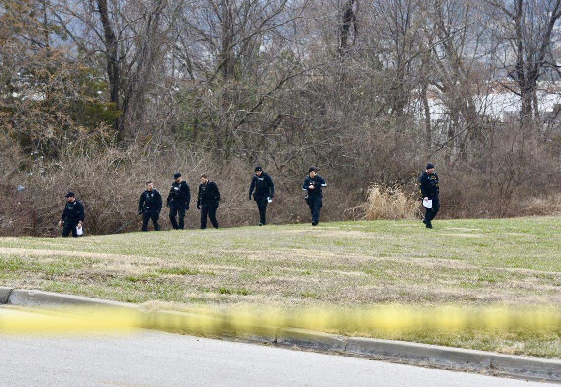 Police conduct an investigation Friday, March 10, 2023 in Gladstone.