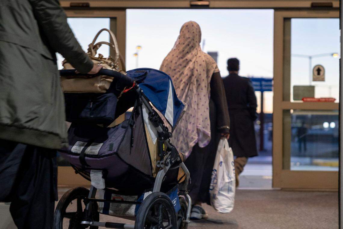 Afghan evacuees arrive at Kansas City International Airport in October.