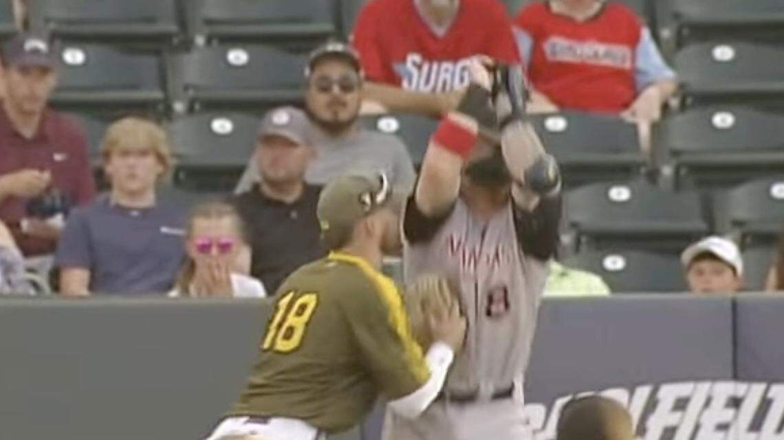 Minor-league baseball player tries to draw a basketball foul before being tagged out