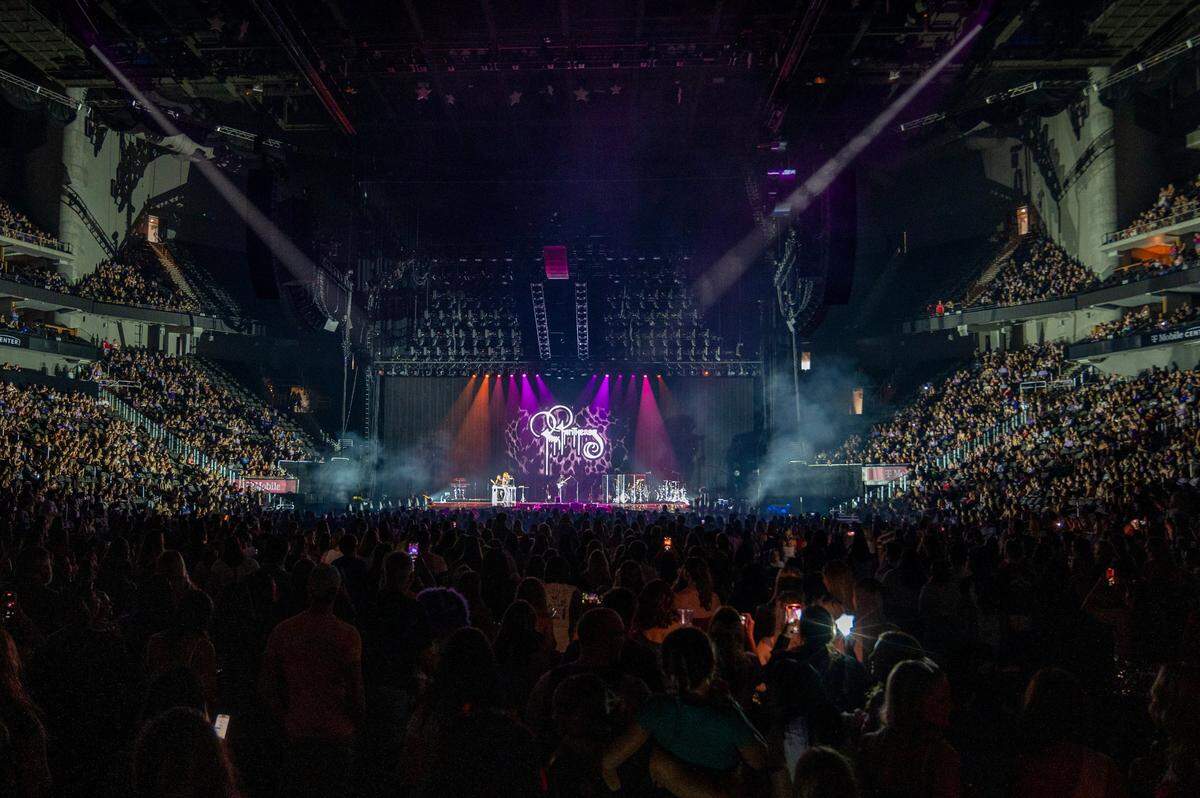 Fans watch singer PinkPantheress perform during the Olivia Rodrigo GUTS World Tour concert at T-Mobile Center on Friday, July 26, 2024, in Kansas City.
