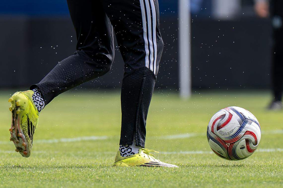 A Sporting Kansas City player kicks a soccer ball during practice at Sporting Park on Tuesday, Feb. 24, 2026, in Kansas City, Kansas.