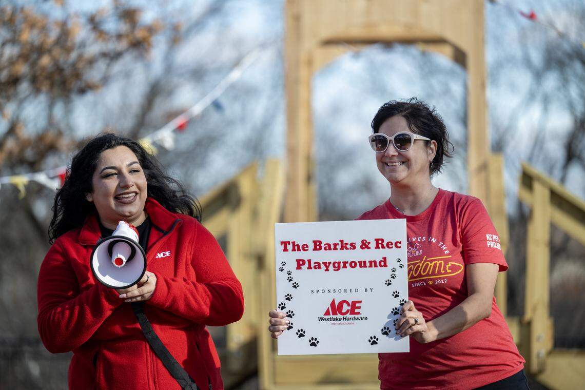 Alicia Weber, left, senior director of marketing, Westlake Ace Hardware, and Kate Meghji, chief executive officer of KC Pet Project, held a leash cutting at KC Pet Project's new “Barks & Rec” Playground, a playground for the shelter dogs sponsored by Westlake Ace Hardware, on Tuesday, Nov. 25, 2025. The new playground is at KC Pet Project's Swope Park campus.