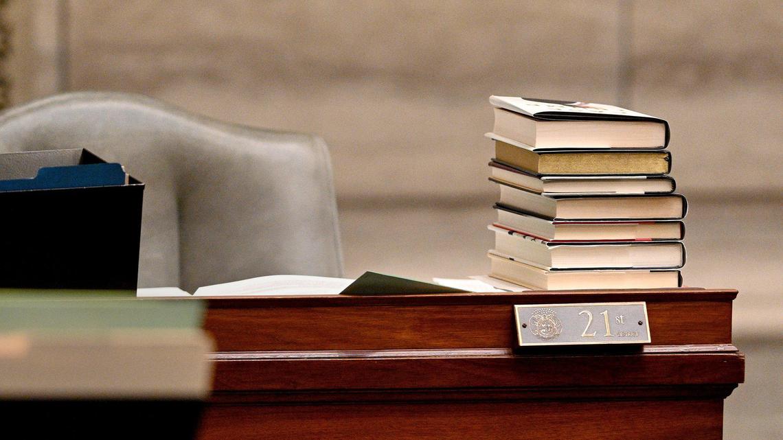 A stack of books sits on the desk of Sen. Denny Hoskins, R-Warrensburg. For weeks, Hoskins read from the books during filibusters.