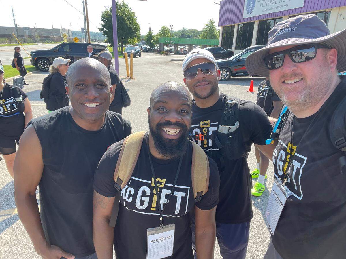 Mayor Quinton Lucas joins members of non-profit KC G.I.F.T. in an early morning stroll along Troost Avenue on Kansas City’s East Side.