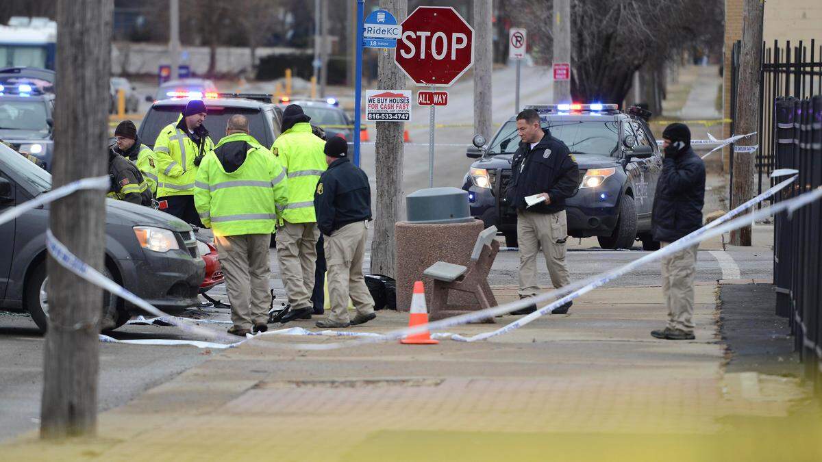 Police investigate a hit-and-run crash Tuesday that killed two people near 18th Street and Brooklyn Avenue in Kansas City.