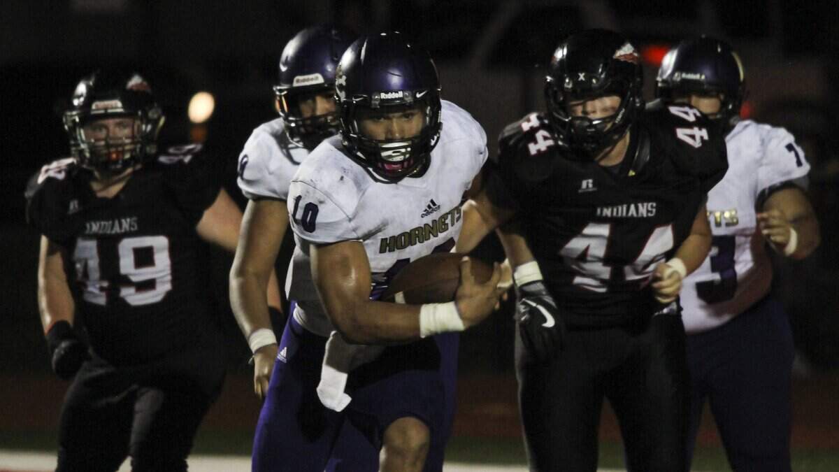 Clyde Price, center, was a game-changer for North Kansas City this season.