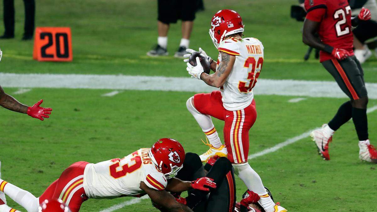 Kansas City Chiefs strong safety Tyrann Mathieu intercepts a Tom Brady pass intended for Bucs wide receiver Mike Evans during the second half of Sunday’s game at Tampa.