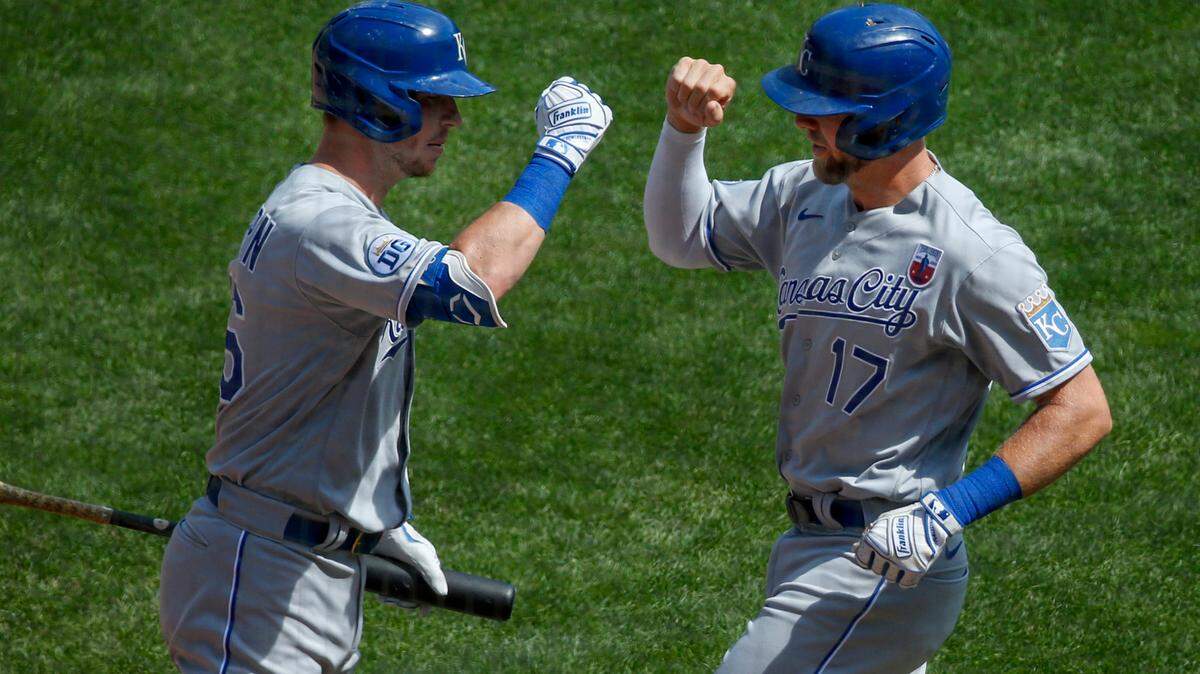 Kansas City Royals’ Hunter Dozier (17) celebrates with Ryan O’Hearn (66) after hitting a solo home run against the Minnesota Twins in the first inning of a baseball game Sunday, Aug. 16, 2020, in Minneapolis. (AP Photo/Bruce Kluckhohn)