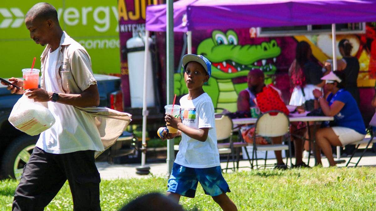A child walks at the Juneteenth KC annual Heritage Festival on June 21, 2025.