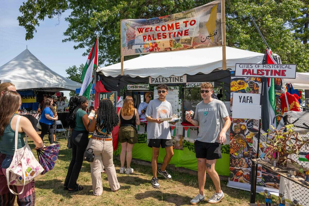The Palestine vendor stand at the Ethnic Enrichment Festival in Swope Park on Saturday, Aug. 16, 2025, in Kansas City. The annual festival celebrates the many different cultures and ethnicities that exist in Kansas City, with vendor booths, cultural education opportunities, and performances.