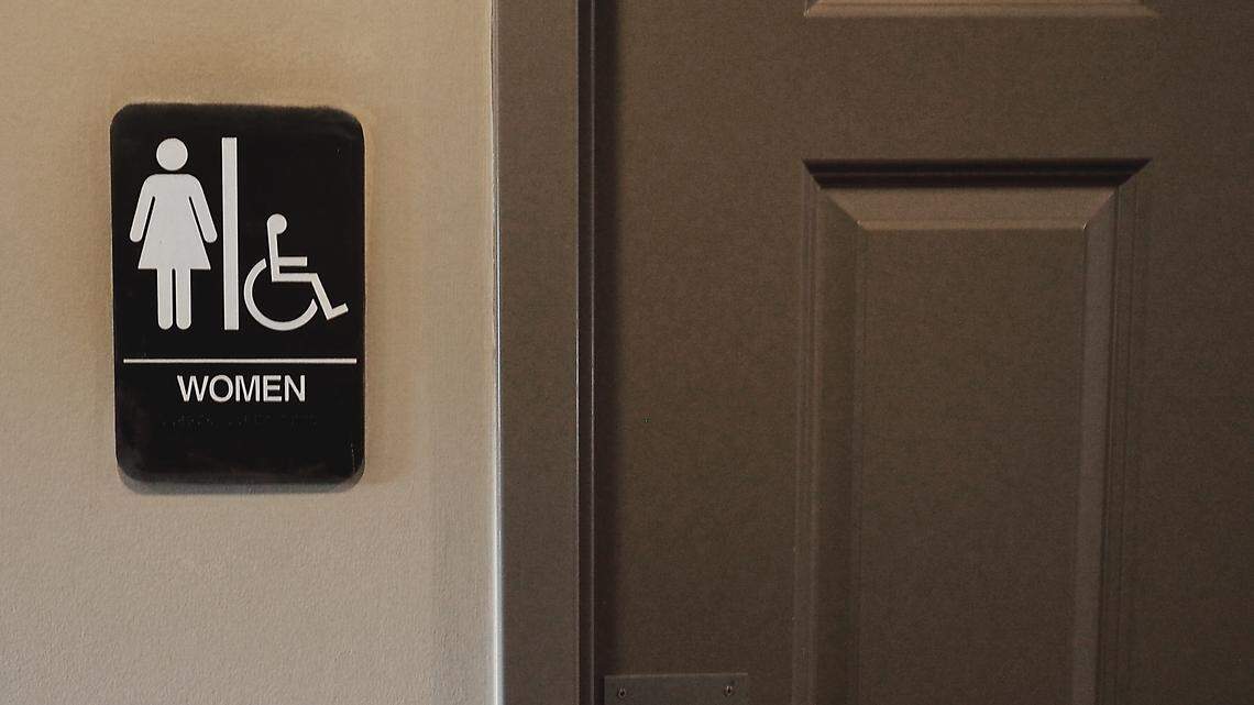 Schools, cities across KC metro scramble to comply with Kansas bathroom law