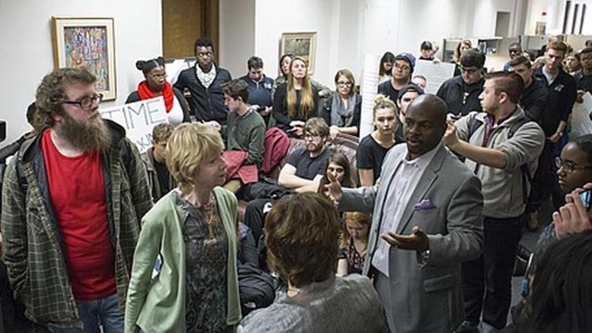 Rock Chalk Invisible Hawks demand inclusion in KU Chancellors office. They talk with E. Nathan Thomas III, Vice Provost for Diversity and Equity.