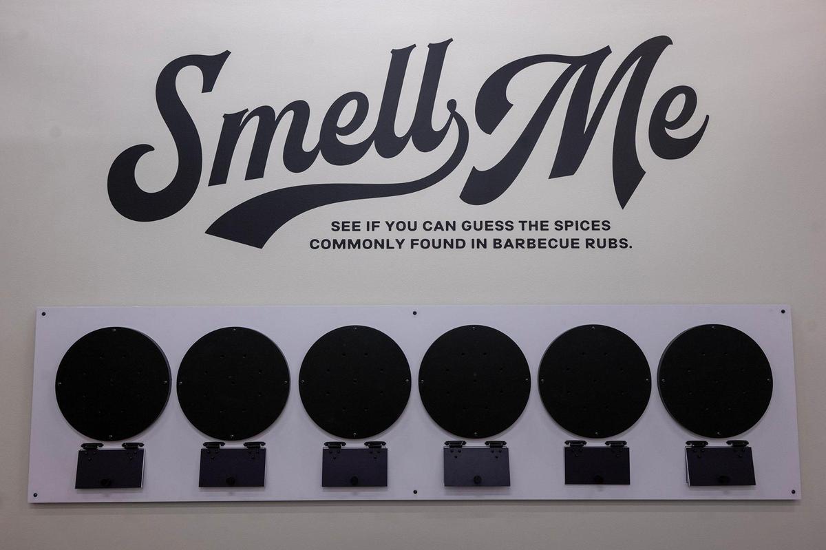 An interactive exhibit at the Museum of BBQ asks visitors to smell and guess the spices found in barbecue sauce.