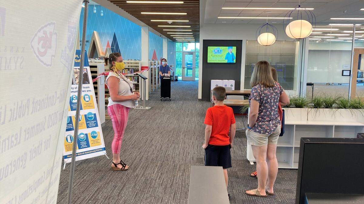 Library staff are providing masked, distanced service at the Mid-Continent Library’s new East Lee’s Summit branch.