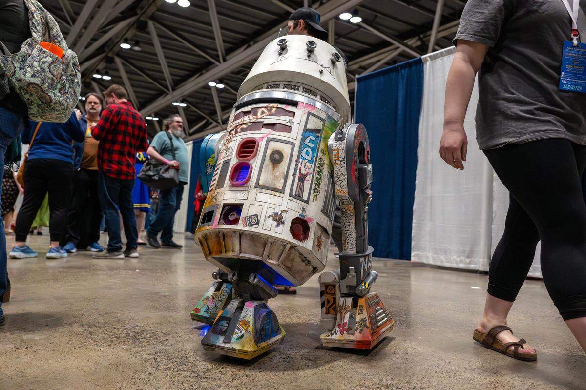 A comic-styled robot from the Star Wars movie franchise is seen during Planet Comicon at the Kansas City Convention Center on Friday, March 21, 2025.