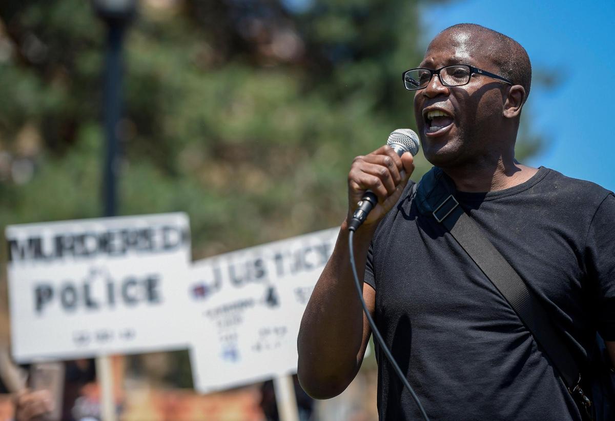 In this file photo Henry C. Service, an organizer with Enough is Enough, spoke to the crowd gathered Sunday, May 31, 2020, at Mill Creek Park in Kansas City during a rally on the third day of George Floyd protests. Service said the event started with speeches and then transitioned to “a good old-fashioned protest.”