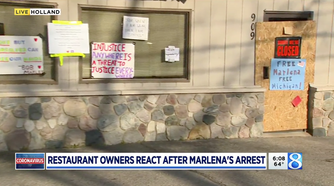 Supporters boarded up and decorated Marlena’s Bistro and Pizzeria to ensure officials it was closed.