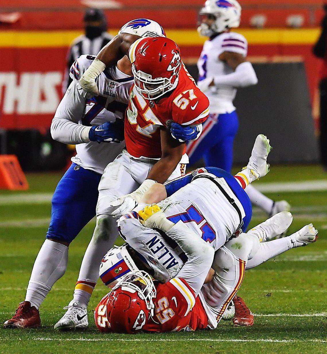 Kansas City Chiefs defensive end Frank Clark, 55, sacks Buffalo Bills quarterback Josh Allen in the fourth quarter Sunday, January 24, 2021, during the AFC Championship Game at Arrowhead Stadium in Kansas City, Missouri.