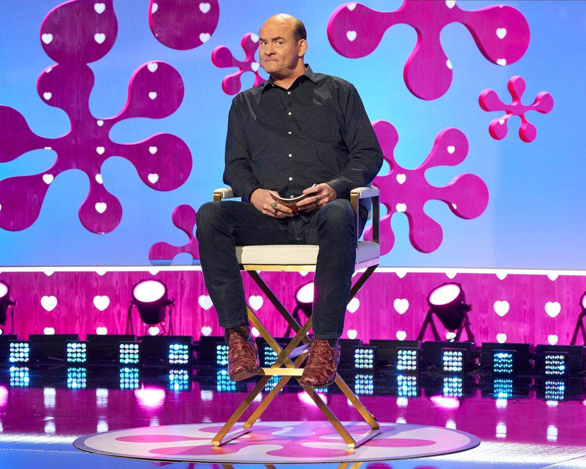 David Koechner, newly single, says he decided to go on “Celebrity Dating Game” “as a lark.” The show is hosted by Zooey Deschanel and Michael Bolton.